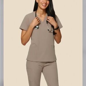 Macchiato colored scrubs, size small, new with tags/never been worn